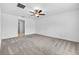 Bedroom with ceiling fan and neutral carpet at 36618 Garden Wall Way, Zephyrhills, FL 33541