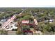 Aerial view of property with trees, streets, and neighborhood landmarks with property boundaries clearly shown at 4009 N 15Th St, Tampa, FL 33610
