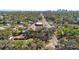 A home covered by trees is surrounded by a residential neighborhood in an overhead, distant shot at 4009 N 15Th St, Tampa, FL 33610