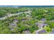 Aerial view of the complex surrounded by mature trees at 4012 Tumble Wood Trl # 104, Tampa, FL 33613