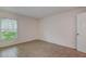 Comfortable bedroom featuring tile floors and bright window at 4012 Tumble Wood Trl # 104, Tampa, FL 33613