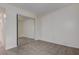 Bedroom with neutral walls and tile floors, featuring a mirrored closet at 4012 Tumble Wood Trl # 104, Tampa, FL 33613