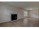 Bright living room featuring a cozy fireplace and tile flooring at 4012 Tumble Wood Trl # 104, Tampa, FL 33613