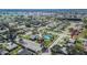 Community aerial showing the property, streets, pool and neighborhood landscape at 4085 105Th N Ave, Clearwater, FL 33762