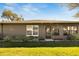 Large back yard with mature landscaping and trimmed lawn at 4085 105Th N Ave, Clearwater, FL 33762