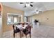 Bright dining area showcasing tile flooring and seamless flow into the living room at 4085 105Th N Ave, Clearwater, FL 33762