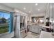 Modern kitchen featuring stainless steel appliances and a bright window with a view at 4085 105Th N Ave, Clearwater, FL 33762