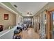 Bright office space with windows and a view into the kitchen at 4085 105Th N Ave, Clearwater, FL 33762