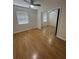 This bedroom has natural light, ceiling fan, and mirrored closet doors at 4111 W Grace St, Tampa, FL 33607