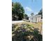 Charming single-story home featuring a fenced yard and storage shed at 4111 W Grace St, Tampa, FL 33607