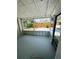 View of Screened porch overlooking fenced backyard at 4111 W Grace St, Tampa, FL 33607