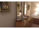 The interior of the bedroom includes a wood dresser, mirrors, and bedroom decor at 432 Flamingo Dr, Apollo Beach, FL 33572