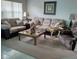 Cozy living room featuring comfortable seating, natural light, and a relaxing atmosphere at 432 Flamingo Dr, Apollo Beach, FL 33572