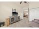 Relaxing bonus room with neutral walls, tiled floors, and easy access to the living and dining areas at 4911 Rock Island Ct, Wimauma, FL 33598
