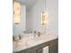 Elegant bathroom vanity with marble countertop and decorative lighting at 501 Barcelona Dr, Tierra Verde, FL 33715