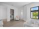 Bright Bedroom with storage and organization, window views, and luxury chair at 501 Barcelona Dr, Tierra Verde, FL 33715