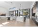 Gourmet kitchen featuring marble island, stainless steel appliances, and a spacious layout at 501 Barcelona Dr, Tierra Verde, FL 33715