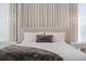 Beautiful main bedroom with floor to ceiling drapes, bedside tables and luxury furnishings at 501 Barcelona Dr, Tierra Verde, FL 33715