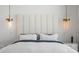 Closeup of main bedroom featuring a king bed with stylish lighting fixtures at 501 Barcelona Dr, Tierra Verde, FL 33715