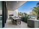 Outdoor patio featuring a TV, furniture, and a beautiful water view at 501 Barcelona Dr, Tierra Verde, FL 33715