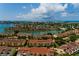 Stunning aerial view showcases the community nestled amidst water, offering tranquil waterfront living and scenic beauty at 505 Sandy Hook Rd # 505, Treasure Island, FL 33706