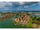 Stunning aerial view of waterfront community with lush landscaping and beautiful views of the bay, gulf, and Intracoastal waterway at 505 Sandy Hook Rd # 505, Treasure Island, FL 33706
