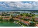 Scenic aerial view of the community showcasing access to waterfront, swimming pool, marina and tennis courts at 505 Sandy Hook Rd # 505, Treasure Island, FL 33706