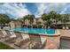 Beautiful community pool with a lounging area, perfect for relaxation and enjoying the Florida sunshine at 505 Sandy Hook Rd # 505, Treasure Island, FL 33706