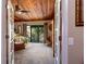 Spacious main bedroom with a wood plank ceiling, opens to a private balcony at 505 Sandy Hook Rd # 505, Treasure Island, FL 33706