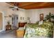 Bright main bedroom with wood plank ceilings featuring a leafy patterned comforter set at 505 Sandy Hook Rd # 505, Treasure Island, FL 33706