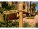 Street sign view of Haven Point Dr. and the community's lush tropical landscaping and exterior architecture at 505 Sandy Hook Rd # 505, Treasure Island, FL 33706