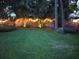 A beautiful backyard with lush green grass and tropical landscaping, perfect for outdoor relaxation and entertaining at 5090 White Pine Ne Cir, St Petersburg, FL 33702