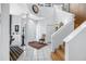 Elegant foyer with a high ceiling, decorative sidelights, staircase, and tile flooring at 5090 White Pine Ne Cir, St Petersburg, FL 33702
