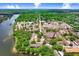 Gorgeous community on lake with mature trees and beautiful landscaping, plus a community pool at 5103 Puritan Cir # 5103, Tampa, FL 33617