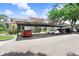 Convenient covered parking is provided with the unit at 5103 Puritan Cir # 5103, Tampa, FL 33617