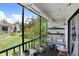 Enjoy the outdoors in this screened-in patio with comfortable seating and peaceful scenery at 5103 Puritan Cir # 5103, Tampa, FL 33617