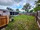 Backyard featuring a wood fence and a covered patio at 5221 82Nd N Ave, Pinellas Park, FL 33781