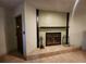 Cozy room features a fireplace at 5221 82Nd N Ave, Pinellas Park, FL 33781