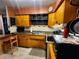 Efficient kitchen layout featuring ample counter space and storage at 5221 82Nd N Ave, Pinellas Park, FL 33781