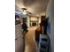 View of cozy living room with fireplace and tile flooring, evoking warmth and comfort at 5221 82Nd N Ave, Pinellas Park, FL 33781
