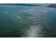 Expansive aerial view of the calm bay waters with distant cityscape views at 55 Rogers St # 502, Clearwater, FL 33756