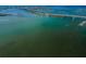 Aerial view of bridge over bay and city skyline in distance at 55 Rogers St # 502, Clearwater, FL 33756