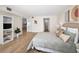 Large bedroom includes hardwood floors, ensuite bathroom, and walk in closet at 55 Rogers St # 502, Clearwater, FL 33756