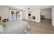 Sun-filled bedroom features a balcony with a view and hardwood floors at 55 Rogers St # 502, Clearwater, FL 33756