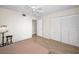 Bedroom with hardwood floors and a large closet is a blank canvas at 55 Rogers St # 502, Clearwater, FL 33756