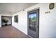 Condo entrance with unit number, secure entry door, and well-lit hallway, providing a safe and welcoming arrival at 55 Rogers St # 502, Clearwater, FL 33756