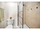 Modern tiled shower has contemporary hardware at 55 Rogers St # 502, Clearwater, FL 33756