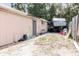 Backyard featuring an outdoor area with an RV and practical exterior storage solutions at 5601 Golden Dr, Tampa, FL 33634