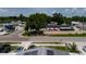 A serene street view from a rooftop with solar panels, highlighting the neighborhood at 5601 Golden Dr, Tampa, FL 33634