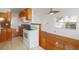 Bright kitchen and dining area with wood floors, and modern appliances including a white range at 5725 18Th S Ave, Gulfport, FL 33707